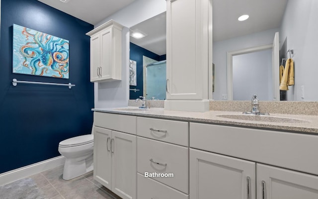 full bath featuring a shower stall, toilet, a sink, and tile patterned flooring