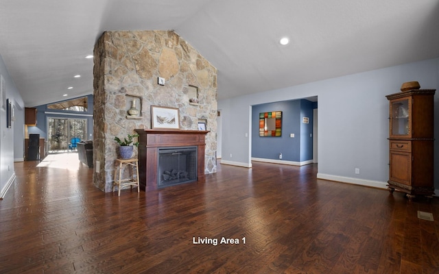 unfurnished living room featuring baseboards, dark wood finished floors, a fireplace, high vaulted ceiling, and recessed lighting