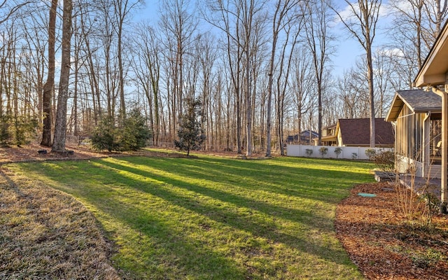 view of yard with a sunroom