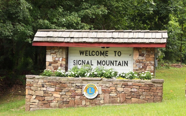 view of community sign