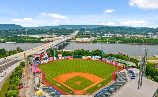 bird's eye view with a water and mountain view