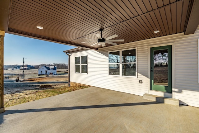 view of patio with ceiling fan