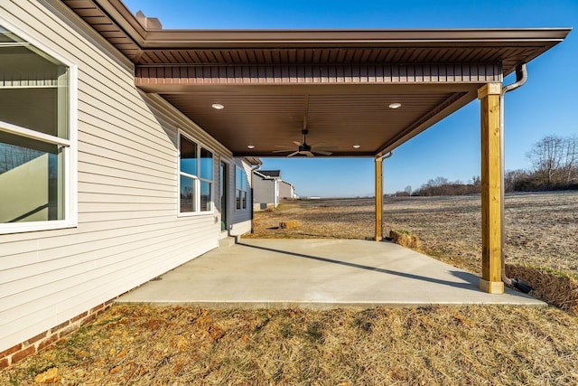 view of patio / terrace featuring ceiling fan