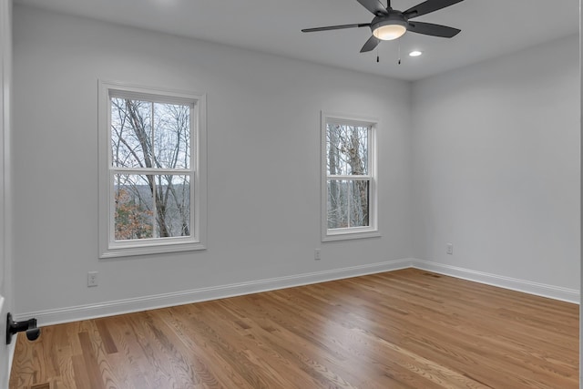 unfurnished room featuring light wood-type flooring, ceiling fan, baseboards, and recessed lighting