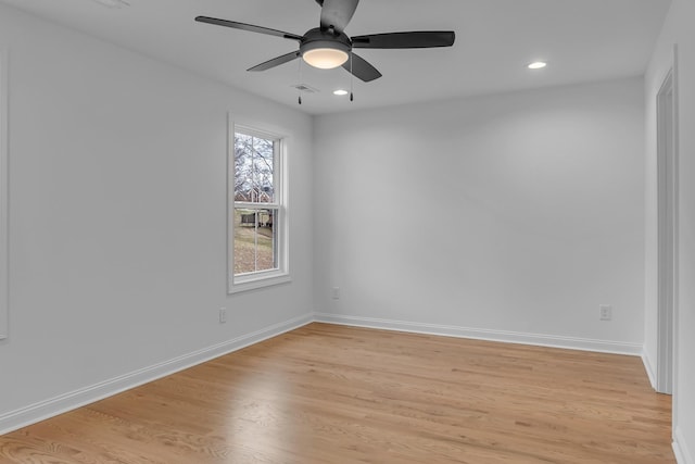 spare room featuring visible vents, baseboards, a ceiling fan, light wood-style flooring, and recessed lighting