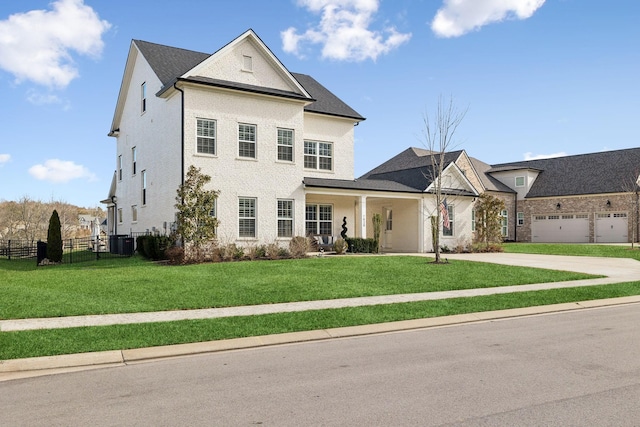 view of front facade with brick siding, fence, central AC, and a front yard