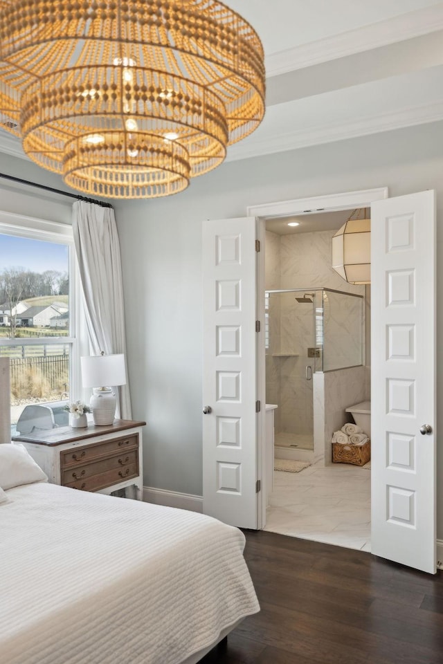 bedroom with ornamental molding, access to exterior, dark wood-style flooring, and connected bathroom