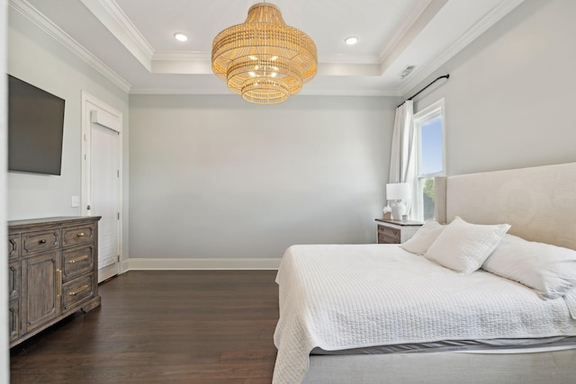 bedroom featuring crown molding, a raised ceiling, dark wood finished floors, and baseboards