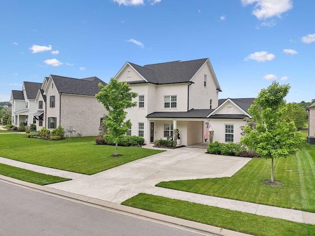 7020 Vineyard Valley Dr, College Grove, TN 37046 - view of front of house featuring a front yard, concrete driveway, and a residential view