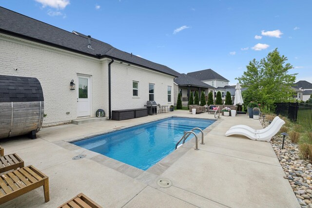 7020 Vineyard Valley Dr, College Grove, TN 37046 - view of swimming pool with an outdoor living space, a patio area, grilling area, and fence
