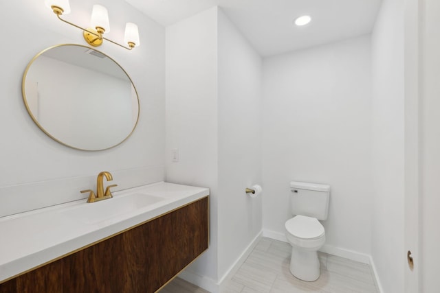 7609 Nolensville Rd, Nolensville, TN 37135 - half bathroom featuring toilet, recessed lighting, visible vents, vanity, and baseboards