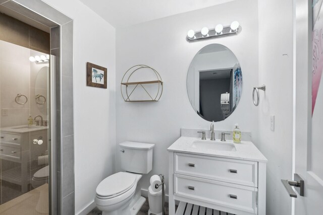 7609 Nolensville Rd, Nolensville, TN 37135 - full bathroom featuring toilet, a shower stall, and vanity