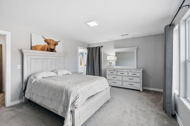 7609 Nolensville Rd, Nolensville, TN 37135 - bedroom featuring light carpet, visible vents, and baseboards