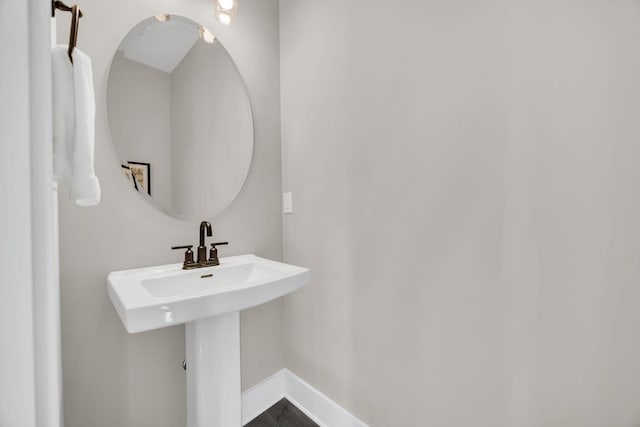 bathroom featuring baseboards