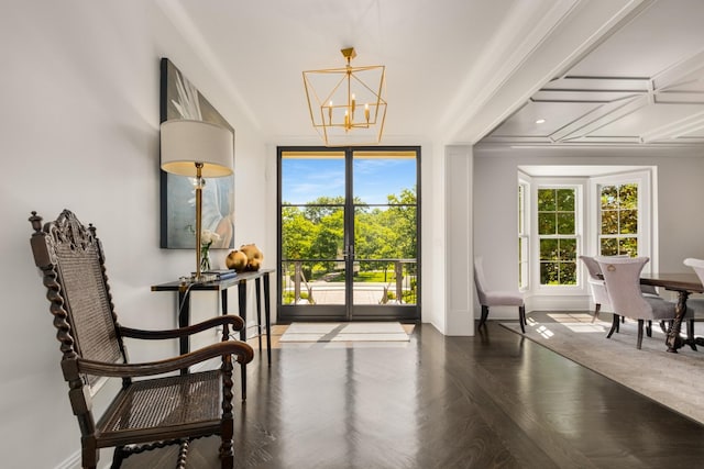 313 Deerwood Ln, Brentwood, TN 37027 - doorway featuring a chandelier, expansive windows, baseboards, and wood finished floors