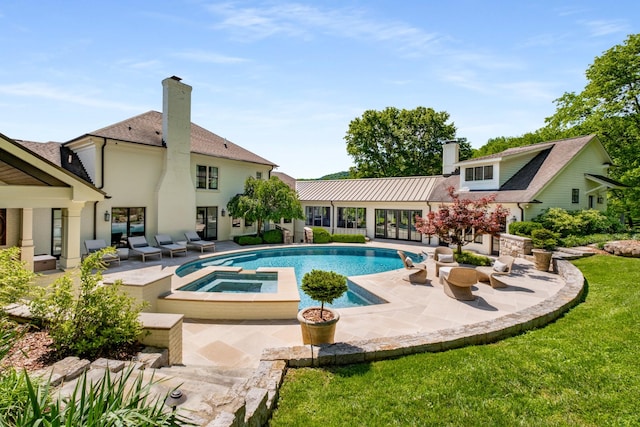 313 Deerwood Ln, Brentwood, TN 37027 - view of swimming pool featuring a patio area, an outdoor hangout area, a yard, and a pool with connected hot tub