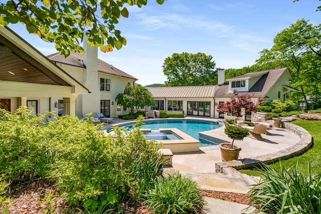 313 Deerwood Ln, Brentwood, TN 37027 - outdoor pool featuring an in-ground hot tub and a patio area