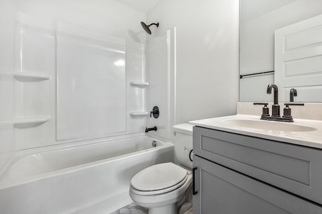 bathroom with marble finish floor, vanity, toilet, and shower / bathtub combination