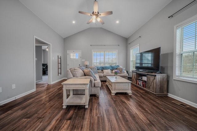 living room featuring plenty of natural light, visible vents, dark wood finished floors, and ceiling fan