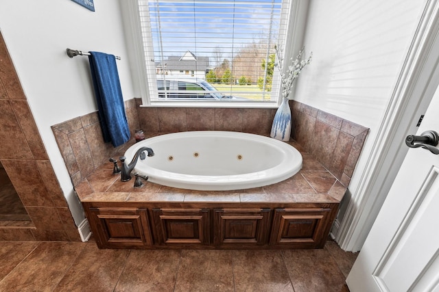 bathroom with a whirlpool tub