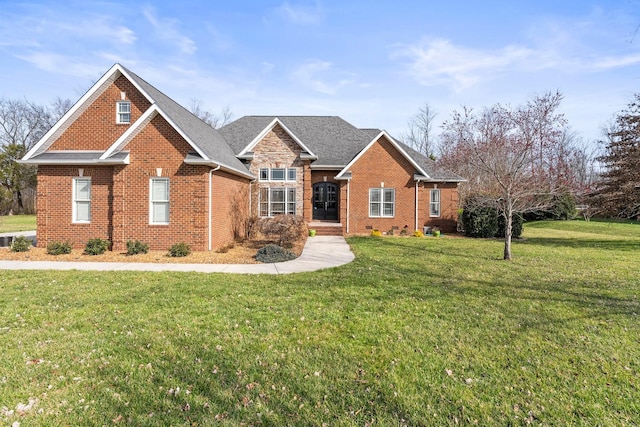 view of front facade featuring a front yard, stone siding, brick siding, and crawl space