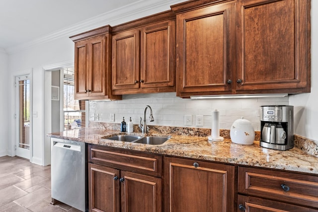 kitchen with dishwasher, ornamental molding, backsplash, light stone countertops, and a sink