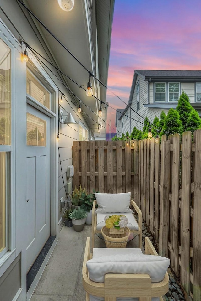 patio terrace at dusk with fence