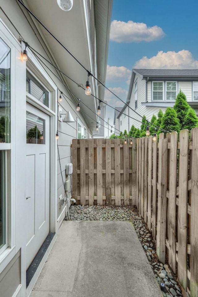 view of patio / terrace featuring fence