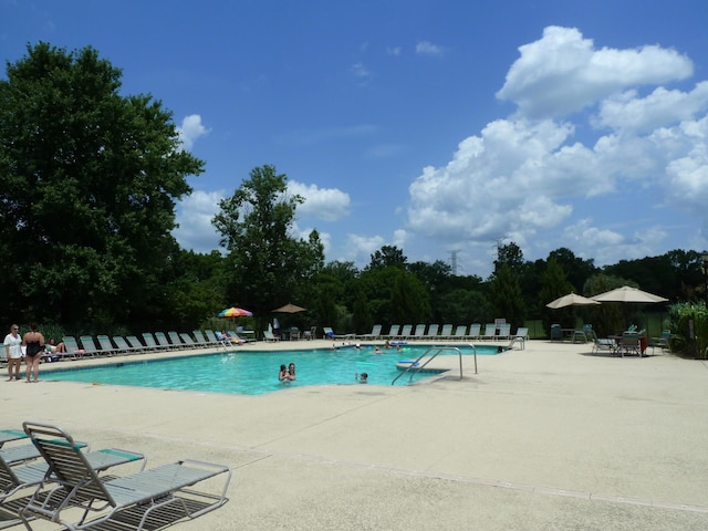 pool featuring a patio area