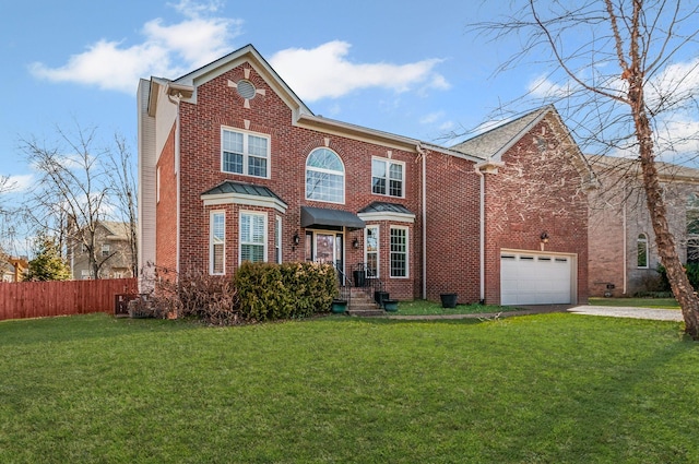 traditional home featuring driveway, brick siding, a front lawn, and fence