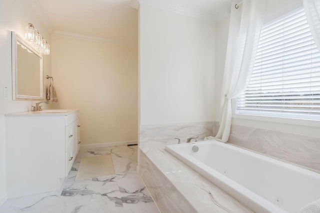 bathroom with marble finish floor, a garden tub, crown molding, vanity, and baseboards