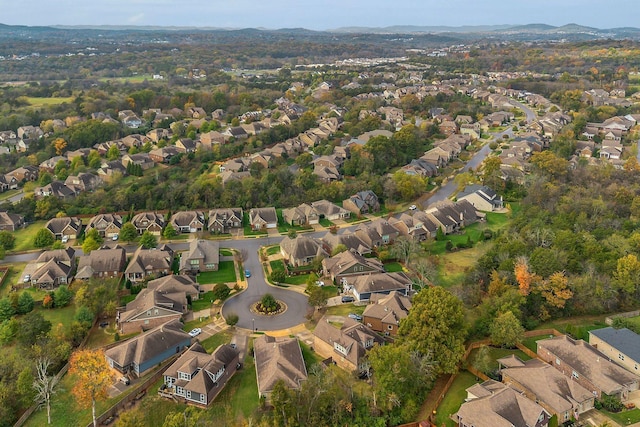 birds eye view of property with a residential view