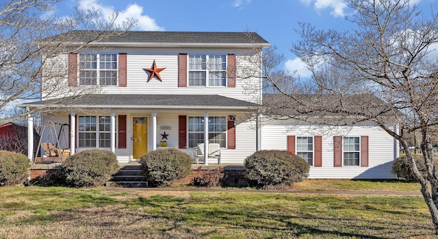 view of front of house featuring a porch and a front yard