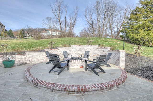 view of patio featuring a fire pit