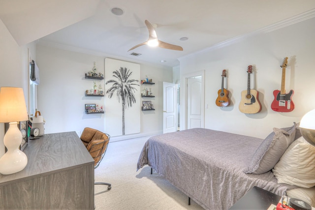 bedroom with light carpet, ceiling fan, ornamental molding, and visible vents