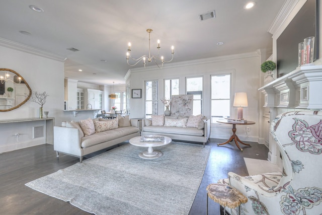 living area with a chandelier, dark wood-style flooring, and visible vents