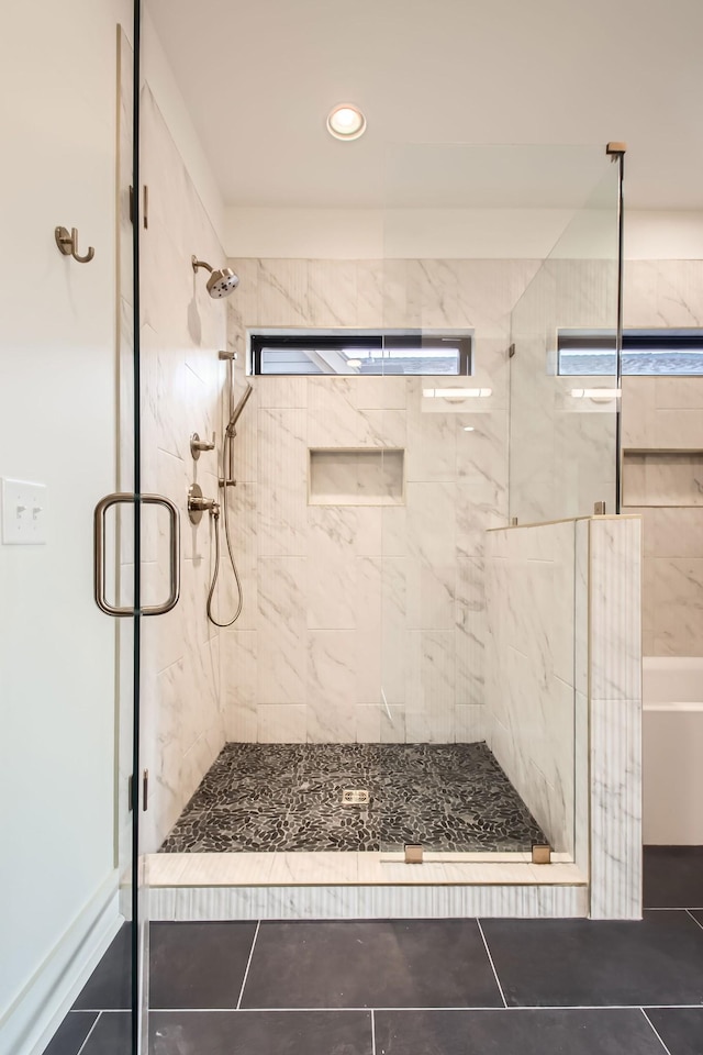 605A Morrow Rd, Nashville, TN 37209 - bathroom featuring a walk in shower and tile patterned flooring
