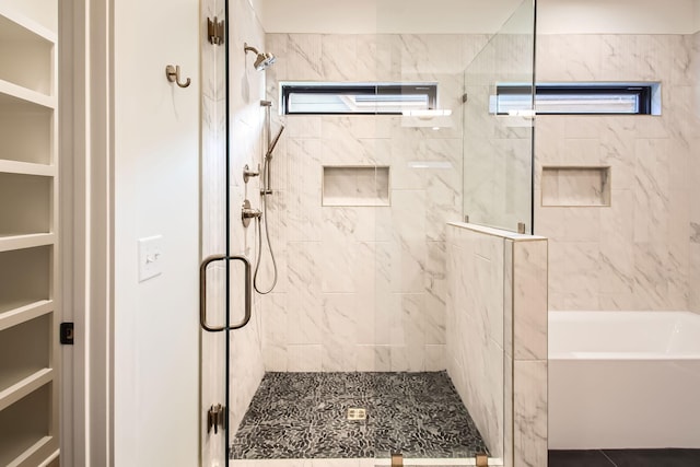 605A Morrow Rd, Nashville, TN 37209 - bathroom featuring a stall shower and a bath