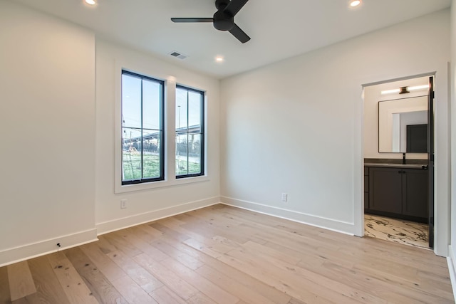 605A Morrow Rd, Nashville, TN 37209 - unfurnished bedroom featuring light wood-type flooring, baseboards, and recessed lighting