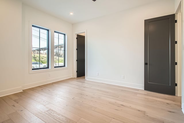 605A Morrow Rd, Nashville, TN 37209 - spare room featuring light wood-type flooring, baseboards, and recessed lighting