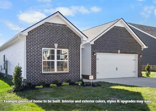 ranch-style house featuring concrete driveway, brick siding, and an attached garage