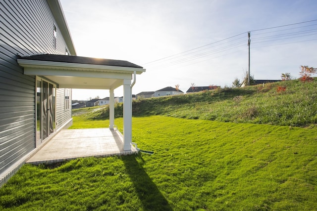 view of yard with a patio area