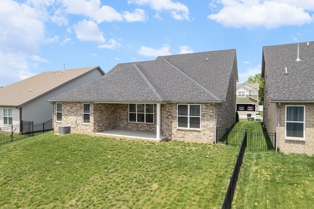 315 Gulfstream Dr, Gallatin, TN 37066 - rear view of house featuring a shingled roof, a patio, brick siding, and cooling unit