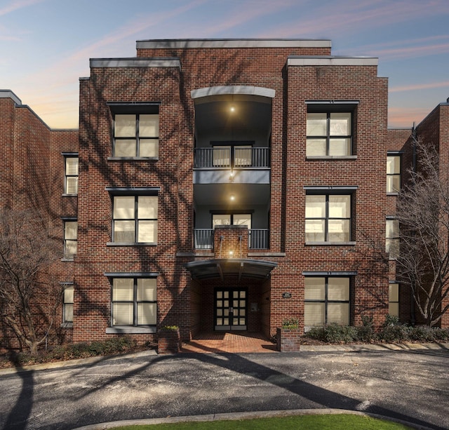 view of front of home with brick siding