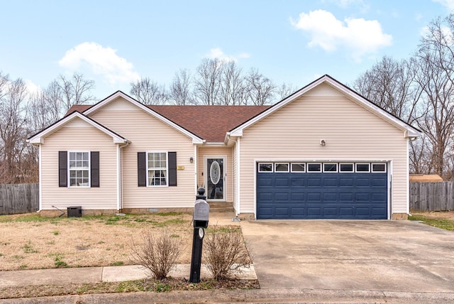 ranch-style home featuring a garage, concrete driveway, crawl space, and fence