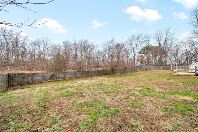 view of yard with a fenced backyard