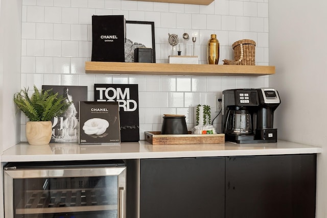 bar with beverage cooler and decorative backsplash