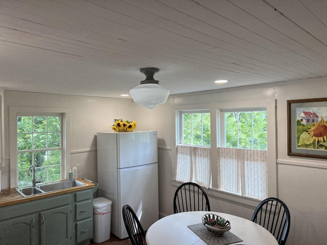 dining room with wooden ceiling
