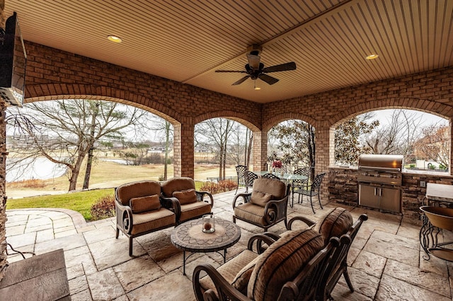 1225 Chloe Dr, Gallatin, TN 37066 - view of patio / terrace featuring outdoor dining area, area for grilling, ceiling fan, exterior kitchen, and an outdoor living space