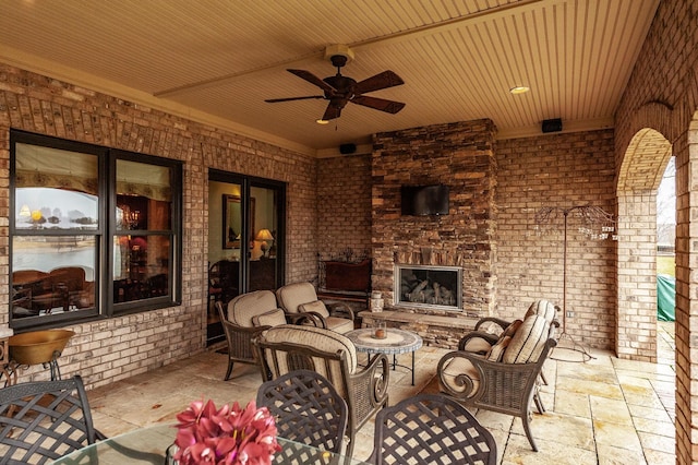 1225 Chloe Dr, Gallatin, TN 37066 - view of patio with an outdoor stone fireplace and a ceiling fan